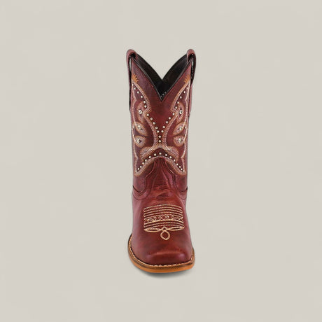 The Blake Cognac - Square Toe Kids Boot, shown from the front against a plain light background, features rich brown leather with decorative white stitching and western patterns.
