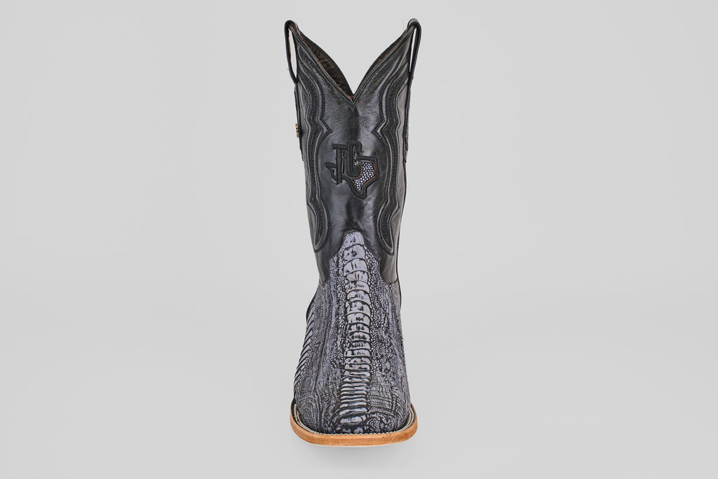 The Austin Leg - Blue Jean - Square Toe men's cowboy boot features a textured, reptile-like pattern and a light brown sole, displayed from the front against a white background—ideal for matching with blue jeans.