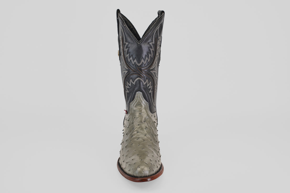 The Austin - Oxford - Round Toe men's cowboy boot features a gray, textured ostrich leather lower and a dark, intricately stitched upper, shown upright on a plain white background.