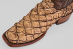 A close-up of the Conor - Matte Orix boot highlights its brown Pirarucu leather with visible scales, a refined Matte Orix finish, and a narrow square toe design.