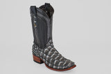 The Conor - Newspaper - Narrow Square Toe boot features black and gray fish leather with a scale-like texture on the foot, a smooth leather shaft, a wooden heel, and a narrow square toe against a plain light gray background.
