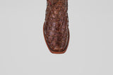 Close-up of the toe of the Conor - Brown - Narrow Square Toe boot, crafted from textured, patterned leather, against a plain white background.