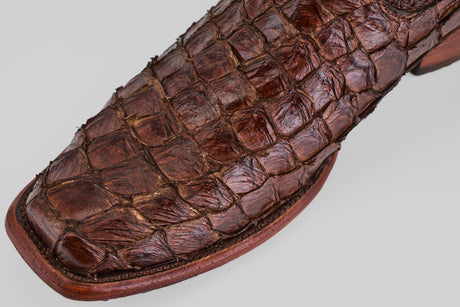 A close-up of the Conor - Brown - Narrow Square Toe boots highlights their detailed stitching and refined shape.
