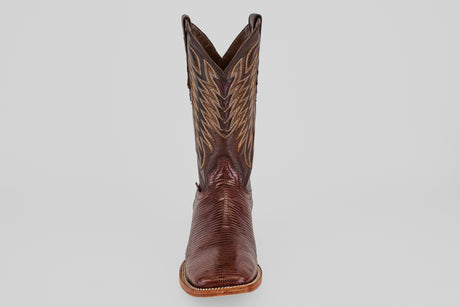 A single Blaze – Brown – Square Toe boot is displayed facing forward on a plain light gray background, highlighting its classic western design and decorative stitching.