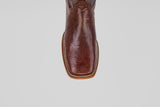 A close-up, top-down view of the toe of the Blaze – Brown – Square Toe boot showcases lizard-textured leather and decorative stitching, highlighting the rugged elegance of this classic western style.