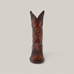 The Over Honey Laser & Embroidery & Woven - Square Toe - CU500 cowboy boot showcases intricate patterns and laser detailing on the shaft and toe, with a distinct C emblem, highlighted against a plain, light background.