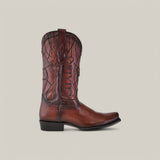 Brown Cuadra leather cowboy boot with intricate stitching, decorative shaft patterns, and CHARRO embossed on the side. The narrow square toe and black heel perfect this Over Chestnut Laser & Embroidery design against a light grey background.